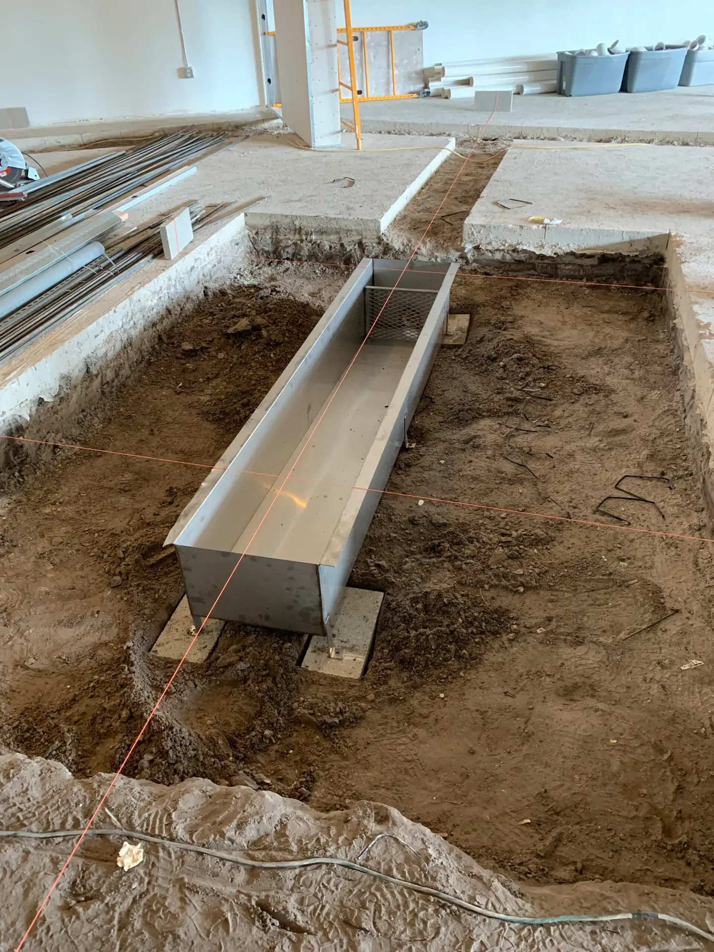 Excavated footing trench with formwork set for a concrete foundation pour